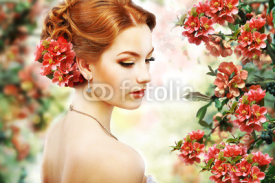 Red Hair Beauty over Natural Floral Background. Nature. Blossom