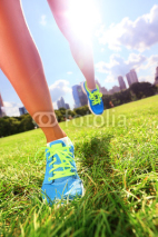 Fototapety Runner - running shoes on woman athlete