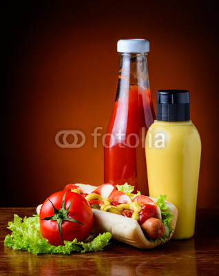 hot dog, vegetables, ketchup and mustard