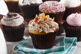Fototapety Assorted Fancy Gourmet Cupcakes with Frosting