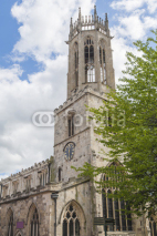 Fototapety Old medieval english church with clock tower