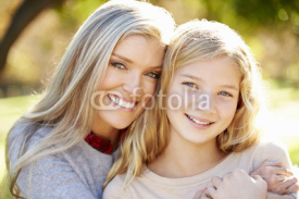 Fototapety Portrait Of Mother And Daughter In Countryside