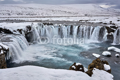 Icelandic landscape with waterfall
