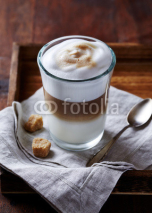 Obrazy i plakaty Glass of Latte Macchiato with Brown Sugar