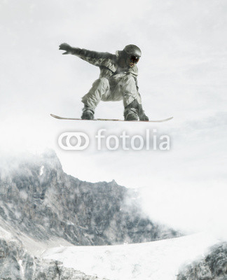 Man jumping with snowboard