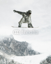 Naklejki Man jumping with snowboard