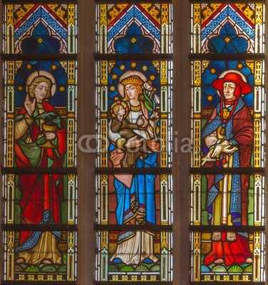 Bruges - Madonna with saints on windowpane in st. Giles church