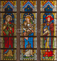 Naklejki Bruges - Madonna with saints on windowpane in st. Giles church