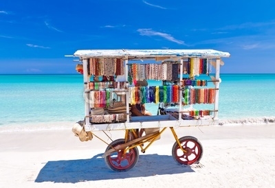 Cart selling typical souvenirs on cuban beach of Varadero