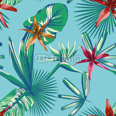 Seamless tropical leaves and flowers blue background