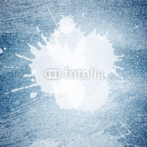Grunge denim texture with white paint blots and copyspace