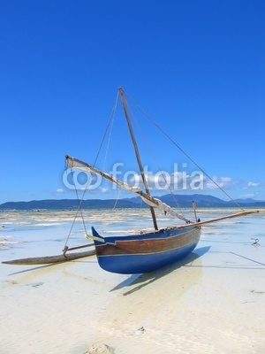 Detail of a fisherman boat laying on a beach, Nosy Iranja