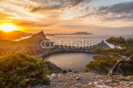Seascape at sunrise in the mountains