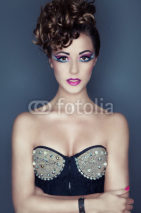 Naklejki Beautiful young woman with professional party make up