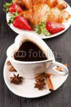 Fototapety Breakfast with coffee in heart shape and croissants in a basket