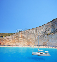 Naklejki Yacht anchored  at Porto Katsiki beach on the island of Lefkada