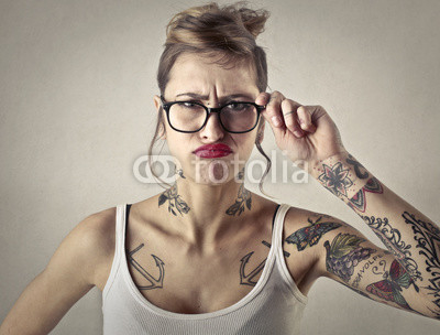 Disappointed tattooed girl