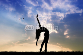 Naklejki girl dancing at sunset