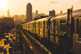 Naklejki Subway Train in New York at Sunset