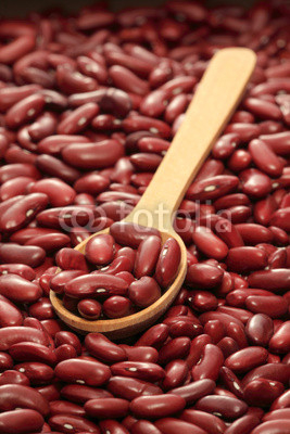 Red beans  with wooden spoon  full frame