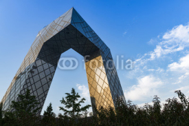 Naklejki BEIJING -July. 24: CCTV Headquarters at twilight on July. 24, 2014 in Beijing, The CCTV building is a loop of six horizontal and vertical sections with a total floor space of 473,000 square meters.