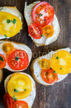 Naklejki Bruschetta sandwiches on wooden background