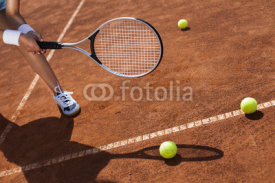 Fototapety Beautiful girl smiling with a tennis racket