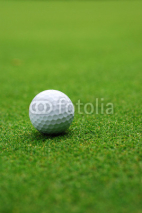 Naklejki Golf ball on the green