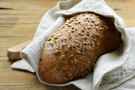 Naklejki loaf of rye bread with sunflower seeds