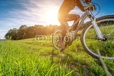 Sport bike, cycling in the beautiful meadow, detail photo,