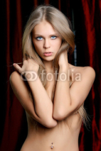 Fototapety Sexy woman in dark studio