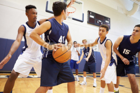 Naklejki Male High School Basketball Team Playing Game