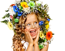 Child with flower hairstyle.