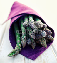 Fototapety Bunch of fresh asparagus on wooden table