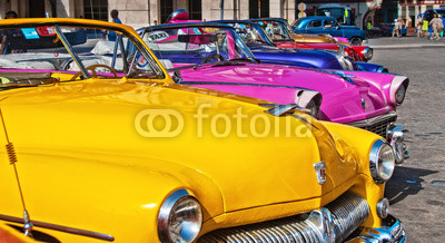 Colorful vintage classic American car in Old Havana street