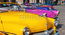 Naklejki Colorful vintage classic American car in Old Havana street
