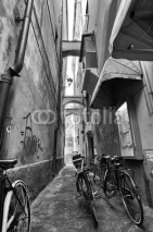 Naklejki Bicycle in small alley