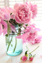 Naklejki Pink peonies in glass jar