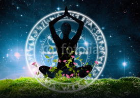 Naklejki Yoga posture and meditation under night sky