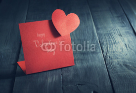 Card Happy Valentine's Day in the old wooden background.
