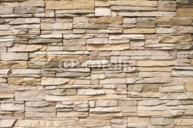 Naklejki Stacked stone wall background horizontal