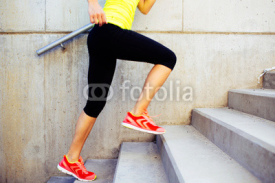 Woman running up the stairs