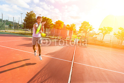 Young Man Playing Tennis