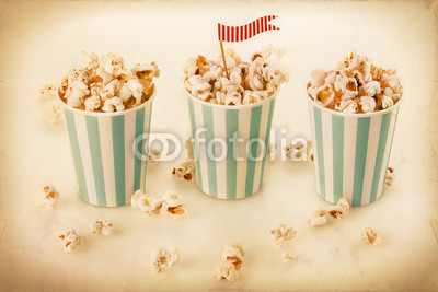 Retro popcorn in a striped cups