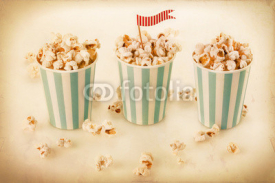 Fototapety Retro popcorn in a striped cups