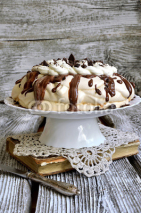 Fototapety Cake "Pavlova" with cream and chocolate.Selective focus.