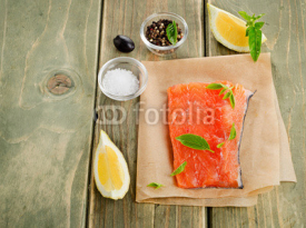 Naklejki Salmon on a wooden board