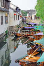 Naklejki Zhouzhuang, Tourist boat in a village canal.