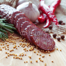 Fototapety Smoked sausage with spices