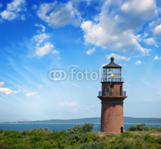 Naklejki Lighthouse on a Island Hill